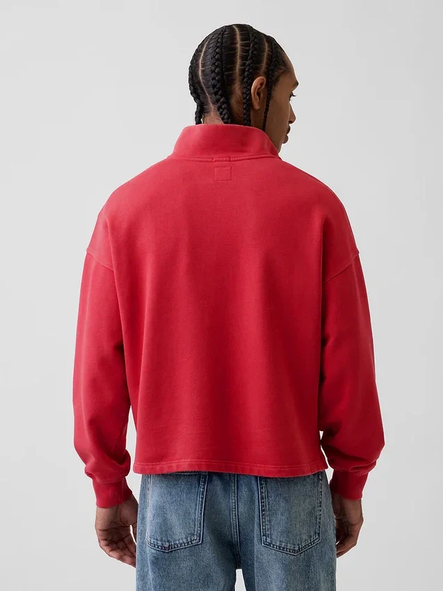Tung, oversized genser med logo og kvart glidelås