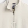 Tung, oversized genser med logo og kvart glidelås