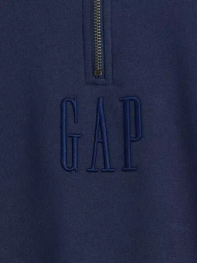 Tung, oversized genser med logo og kvart glidelås