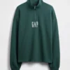Tung, oversized genser med logo og kvart glidelås