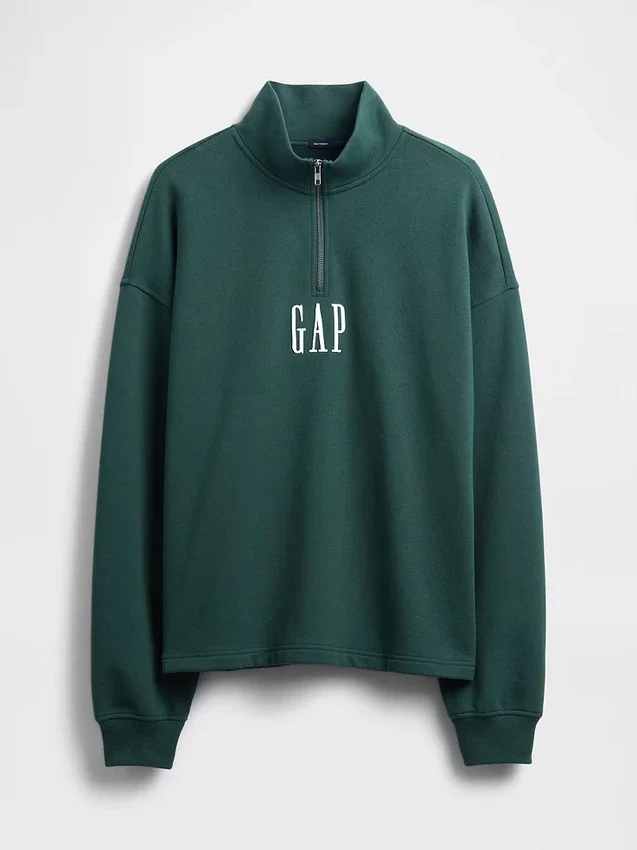 Tung, oversized genser med logo og kvart glidelås