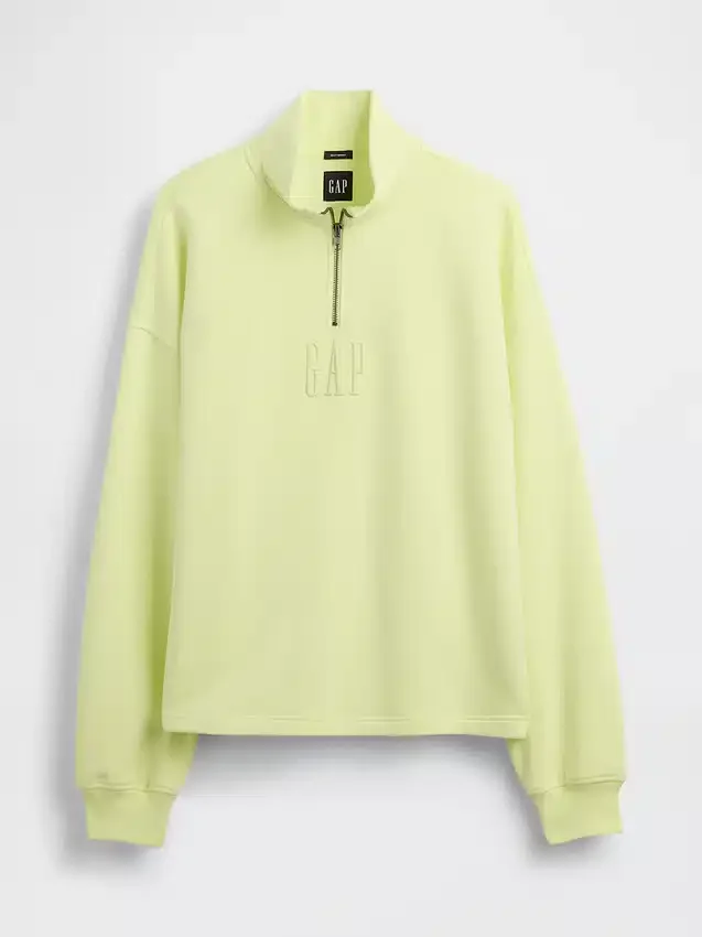 Tung, oversized genser med logo og kvart glidelås