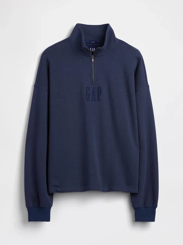 Tung, oversized genser med logo og kvart glidelås