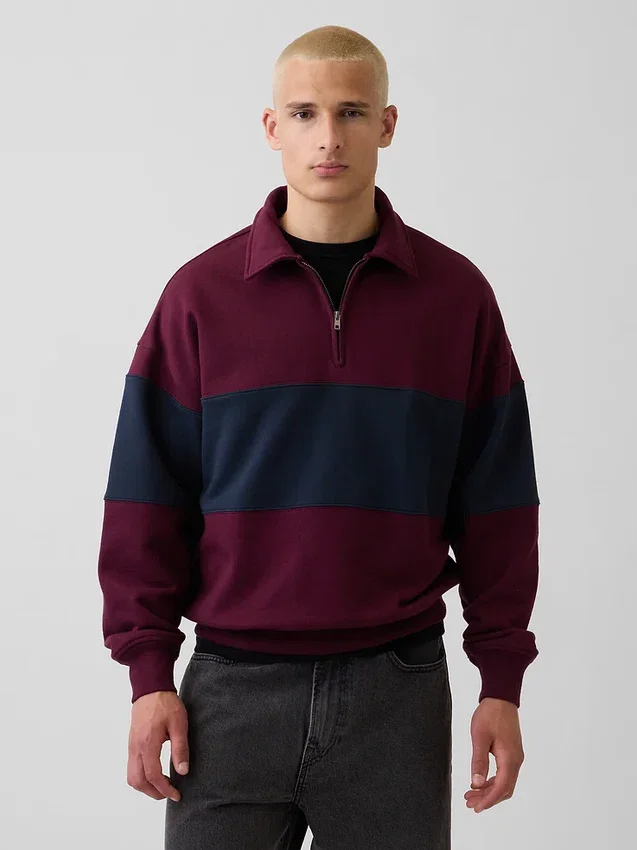 Tung, oversized genser med striper og halv glidelås