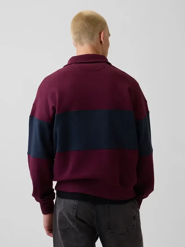 Tung, oversized genser med striper og halv glidelås