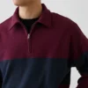Tung, oversized genser med striper og halv glidelås