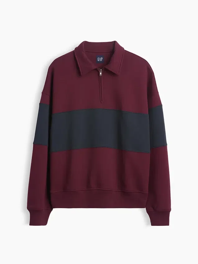 Tung, oversized genser med striper og halv glidelås