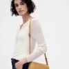 Vegansk suede-veske i tønneform