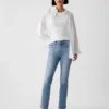 Vintage-jeans med middels høy midje, smal passform og splittet kant