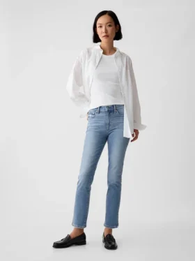 Vintage-jeans med middels høy midje, smal passform og splittet kant