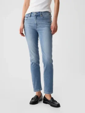 Vintage-jeans med middels høy midje, smal passform og splittet kant