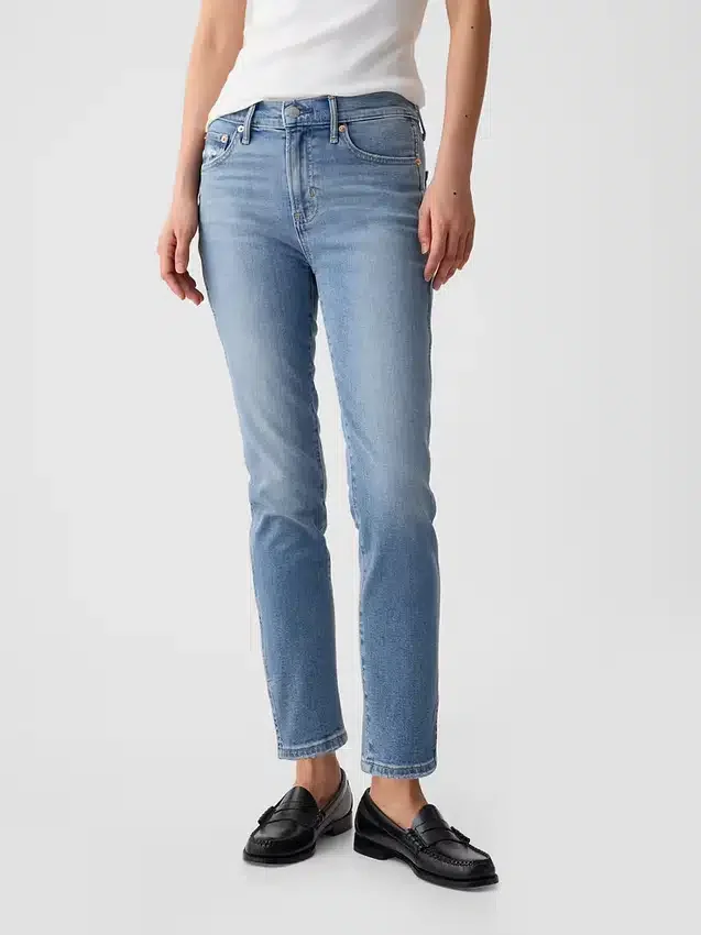 Vintage-jeans med middels høy midje, smal passform og splittet kant