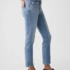 Vintage-jeans med middels høy midje, smal passform og splittet kant