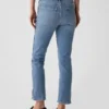 Vintage-jeans med middels høy midje, smal passform og splittet kant