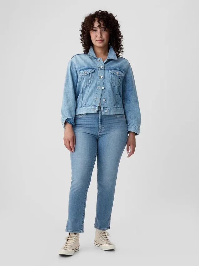 Vintage-jeans med middels høy midje, smal passform og splittet kant