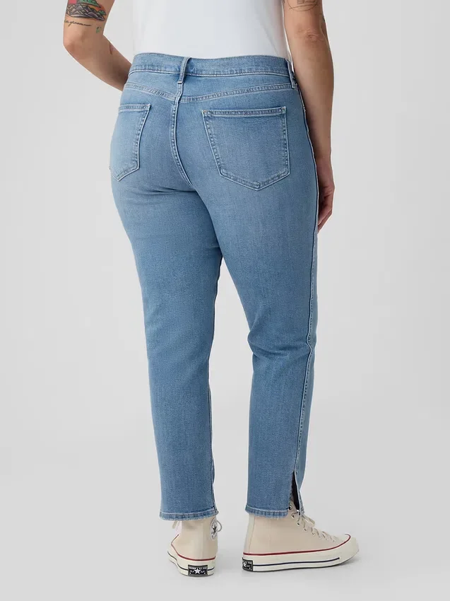 Vintage-jeans med middels høy midje, smal passform og splittet kant
