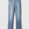 Vintage-jeans med middels høy midje, smal passform og splittet kant
