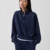 Vintagesoft oversized genser med halv glidelås og kileformet hals