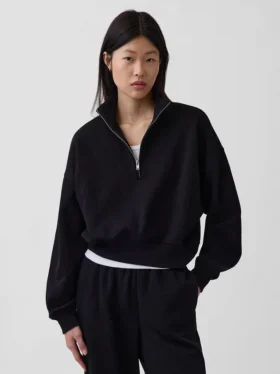 Vintagesoft oversized genser med halv glidelås og kileformet hals