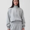 Vintagesoft oversized genser med halv glidelås og kileformet hals