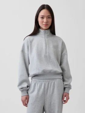 Vintagesoft oversized genser med halv glidelås og kileformet hals