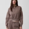 Vintagesoft oversized genser med halv glidelås og kileformet hals