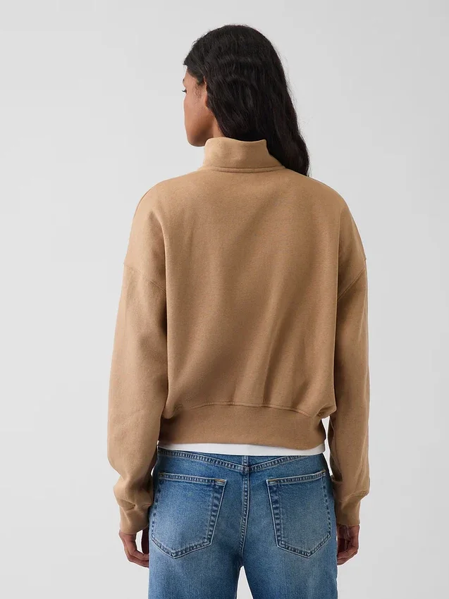Vintagesoft oversized genser med halv glidelås og kileformet hals