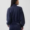 Vintagesoft oversized genser med halv glidelås og kileformet hals