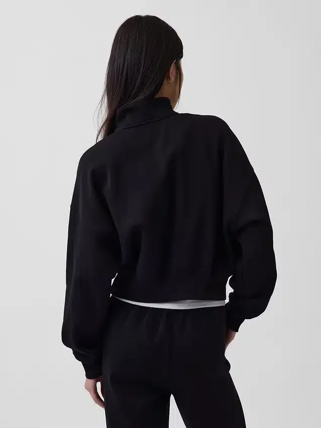 Vintagesoft oversized genser med halv glidelås og kileformet hals