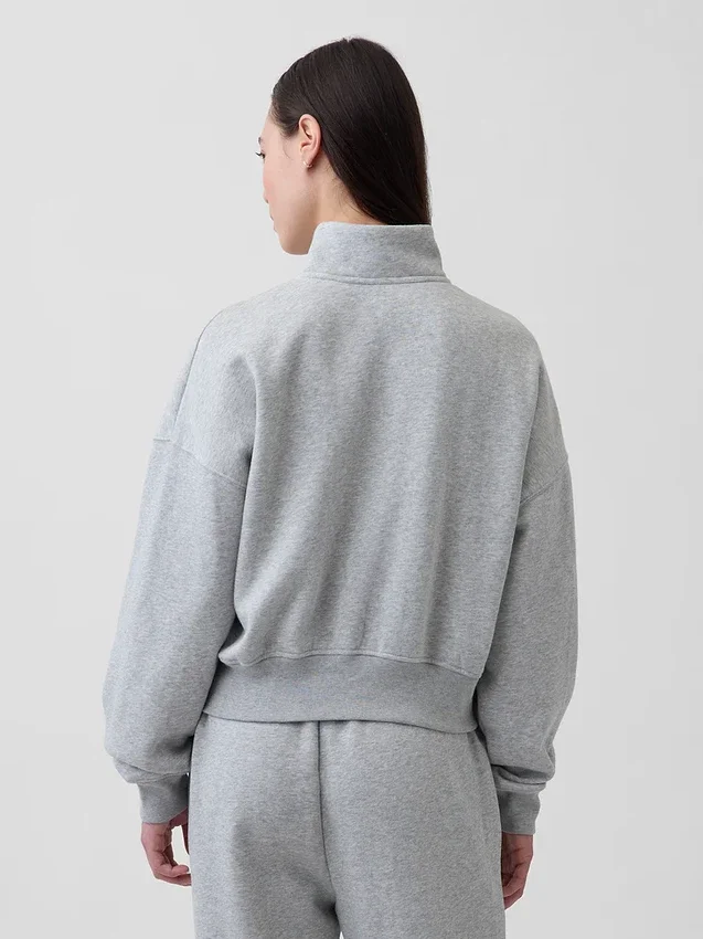 Vintagesoft oversized genser med halv glidelås og kileformet hals