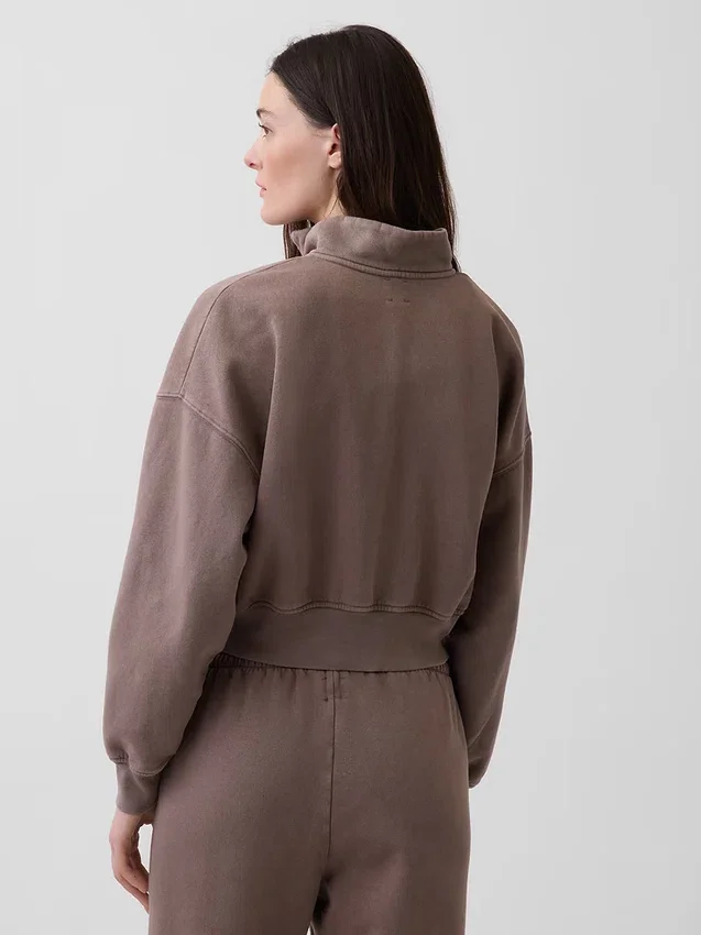 Vintagesoft oversized genser med halv glidelås og kileformet hals