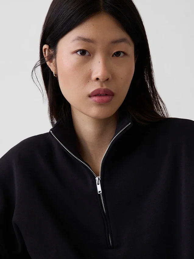 Vintagesoft oversized genser med halv glidelås og kileformet hals