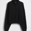 Vintagesoft oversized genser med halv glidelås og kileformet hals
