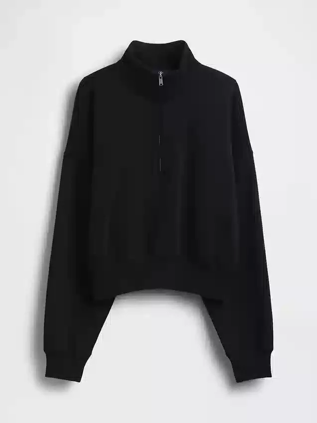 Vintagesoft oversized genser med halv glidelås og kileformet hals