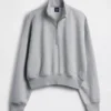 Vintagesoft oversized genser med halv glidelås og kileformet hals